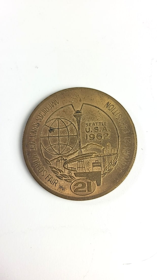 1962 Seattle Worlds Fair Century 21 Exposition One Dollar Token: 2 x 2 x 0.1 0.1 lb Low Estimate: 5.00 High Estimate: 20.00