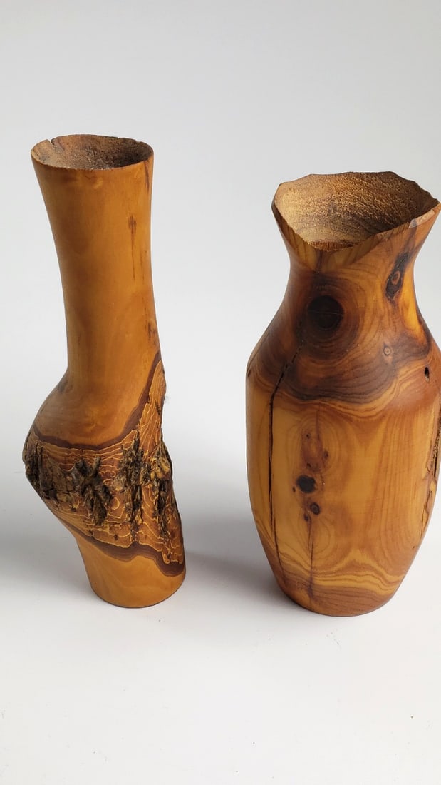 Pair of Turned Wood Natural Edge Vases with Bark Detail: 4 x 12 x 4 1.2 lb Low Estimate: 25.00 High Estimate: 60.00