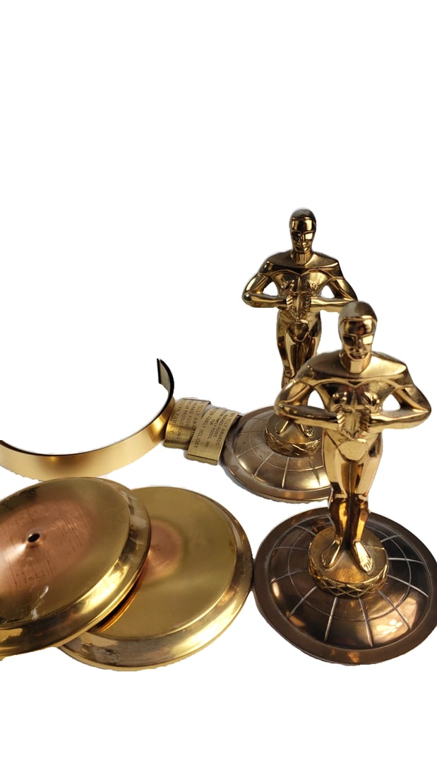 S. Owens & Co. 1977 Pair of Gold Metal Oscar-Style Trophy Statuettes & Parts: need put back together 5 x 10 x 5 3 lb Low Estimate: 20.00 High Estimate: 75.00