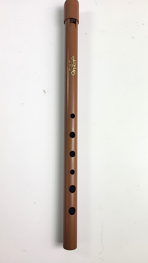 Susato D Brown Plastic Tin Whistle Made in USA: 1 x 12 x 1 0.2 lb Low Estimate: 15.00 High Estimate: 30.00