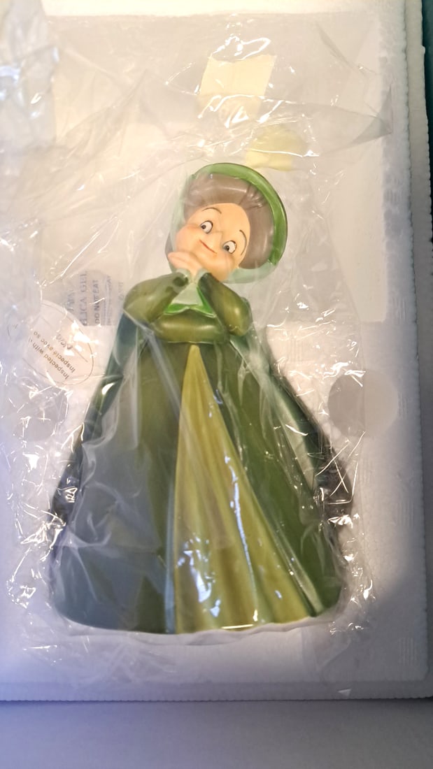 Walt Disney Classics Collection Fauna A Little Bit Of Both Sleeping Beauty Figurine: 14 x 9 x 9 3 lb Low Estimate: 30.00 High Estimate: 125.00