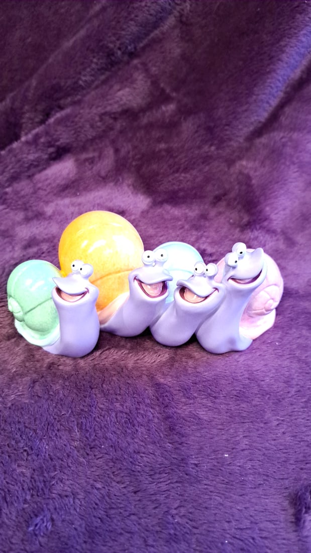 Walt Disney Classics Collection Purple Snails Porcelain Figurine With Box: 7 x 4 x 8 5lb Low Estimate: 20.00 High Estimate: 25.00