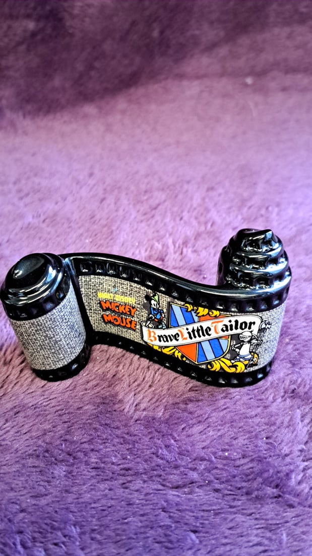 Walt Disney Classics Collection Mickey Mouse Brave Little Tailor Film Reel Figurine With Box: 3 x 6 x 1. 5 0. 5 lb Low Estimate: 15.00 High Estimate: 35.00