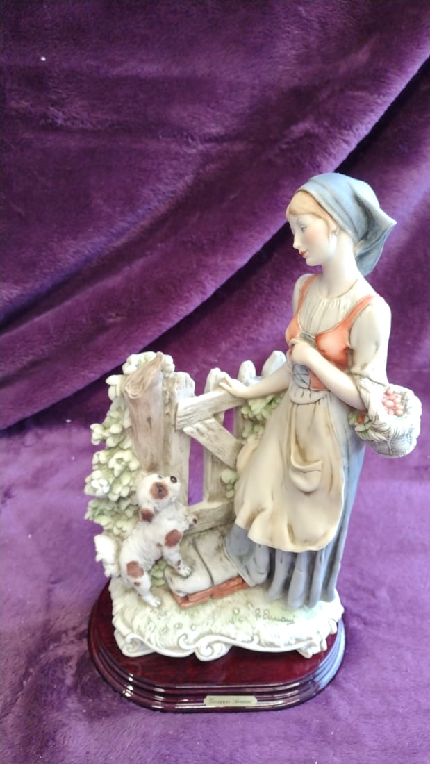 Giuseppe Armani Florence Figurine Country Girl With Dog On Wood Base: 11 x 16 x 7 3. 5 lb Low Estimate: 50.00 High Estimate: 200.00