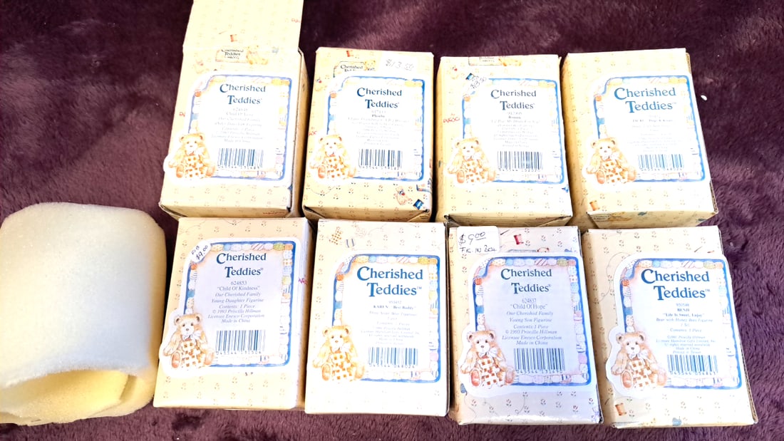 Enesco Cherished Teddies Our Cherished Family Figurines Lot Of 8 Boxed: 3 x 8 x 12 1. 5 lb Low Estimate: 20.00 High Estimate: 60.00