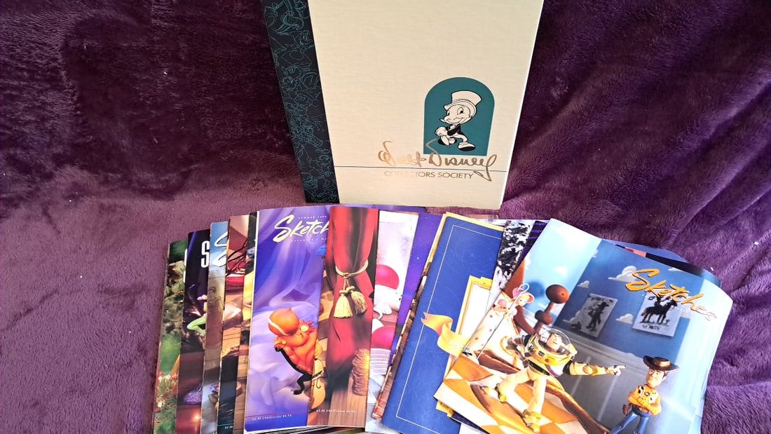 Walt Disney Collectors Society Sketches Magazine Lot With Jiminy Cricket Box: 11 x 16 x 2 3 lb Low Estimate: 50.00 High Estimate: 100.00