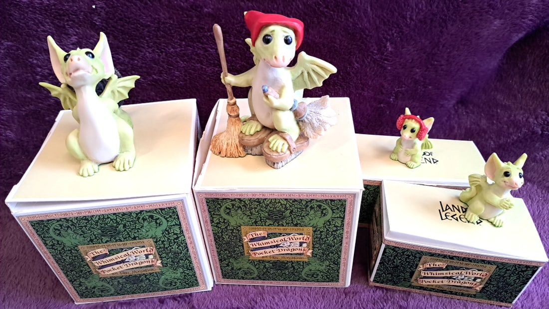 Real Musgrave The Whimsical World Of Pocket Dragons Land Of Legend Figurines Lot Of 4 With Boxes: 6x6x15 3lbs Low Estimate: 50.00 High Estimate: 100.00