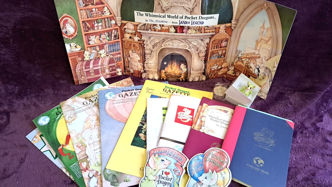 Collectible World Studios Pocket Dragons Real Musgrave Lot With Figurine, Gazettes, Books, Pin, K...: 9x12x3 3lbs Low Estimate: 30.00 High Estimate: 100.00