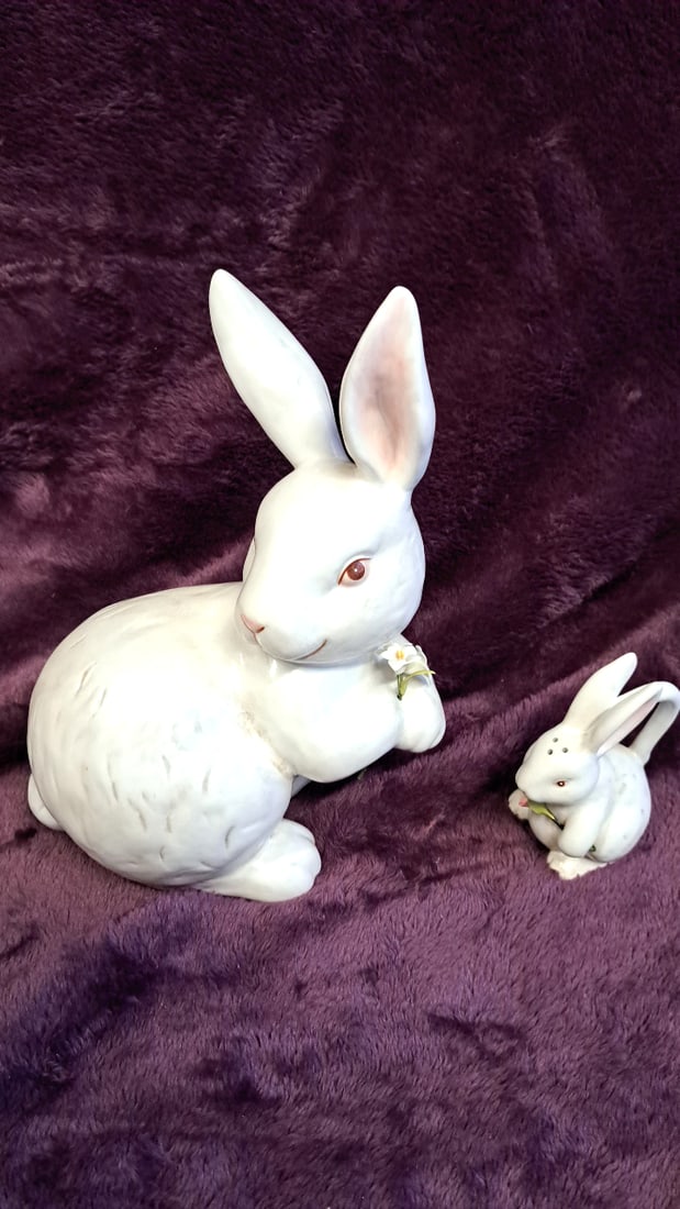 White Ceramic Rabbit Figurines Pair, Large Bunny With Flower And Small Bunny: 15 x 10 x 8 5 lb Low Estimate: 150.00 High Estimate: 50.00