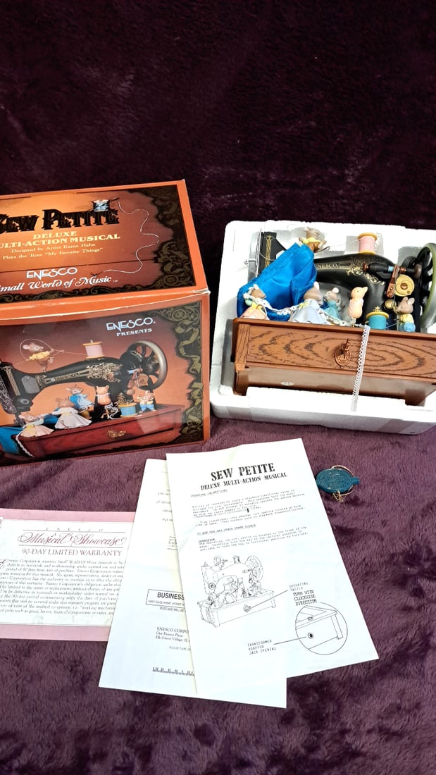 Enesco Sew Petite Deluxe Multi-action Musical Sewing Machine Music Box With Mice Figures: 11 x 12 x 6.2. 5 lb Low Estimate: 25.00 High Estimate: 75.00