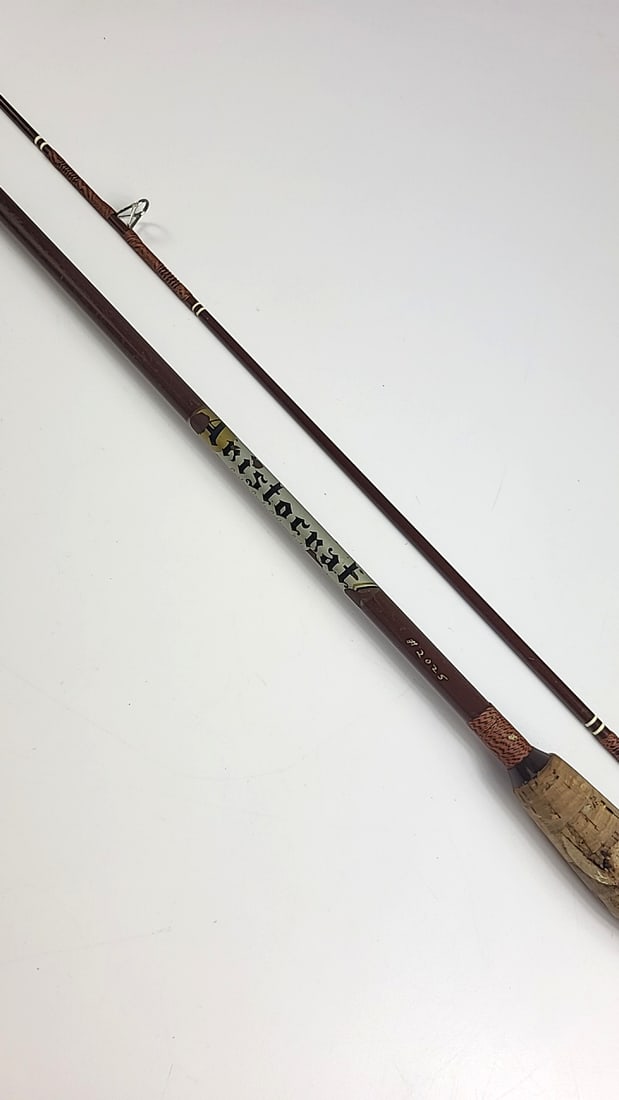 Aristocrat Custom Grade #2025 Brown Fishing Rod With Cork Handle: 48x2x2 1lb Low Estimate: 30.00 High Estimate: 150.00