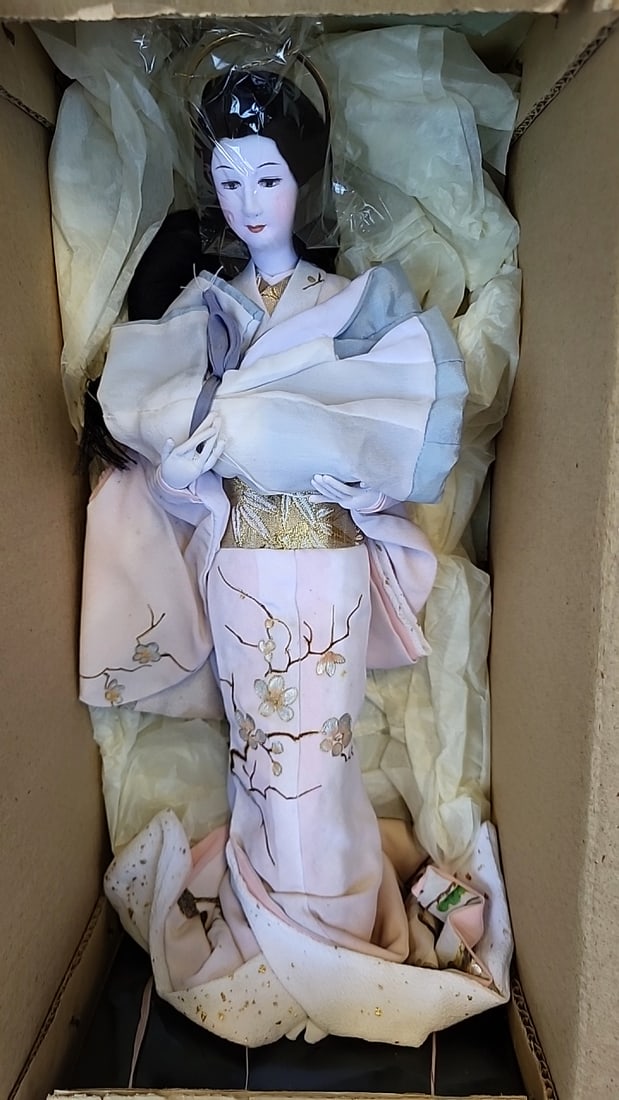 Japanese Kimono Doll with Pink Embroidered Floral Robe and Box: 15 x 6 x 6 2 lb Low Estimate: 15.00 High Estimate: 75.00