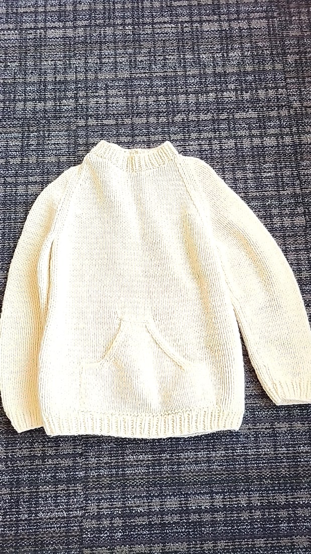 Cream Hand Knit Pullover Sweater with Kangaroo Pocket and Raglan Sleeves: Hand knit 12x12x12 3 Low Estimate: 12.00 High Estimate: 45.00