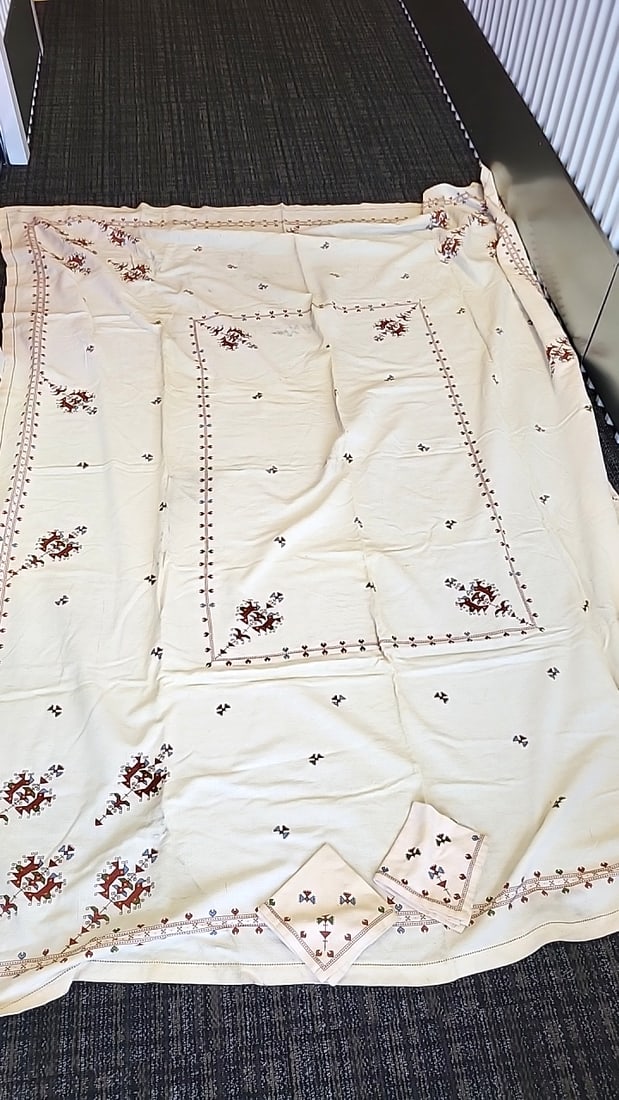 Cream Embroidered Table cloth with 2 Napkins Geometric Folk Pattern: Stains and marks 12x13x10 6 Low Estimate: 8.00 High Estimate: 35.00