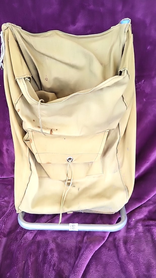 Tan Canvas External Frame Backpack with Aluminum Frame and Shoulder Straps: 14 x 24 x 8 5 lb Low Estimate: 15.00 High Estimate: 45.00