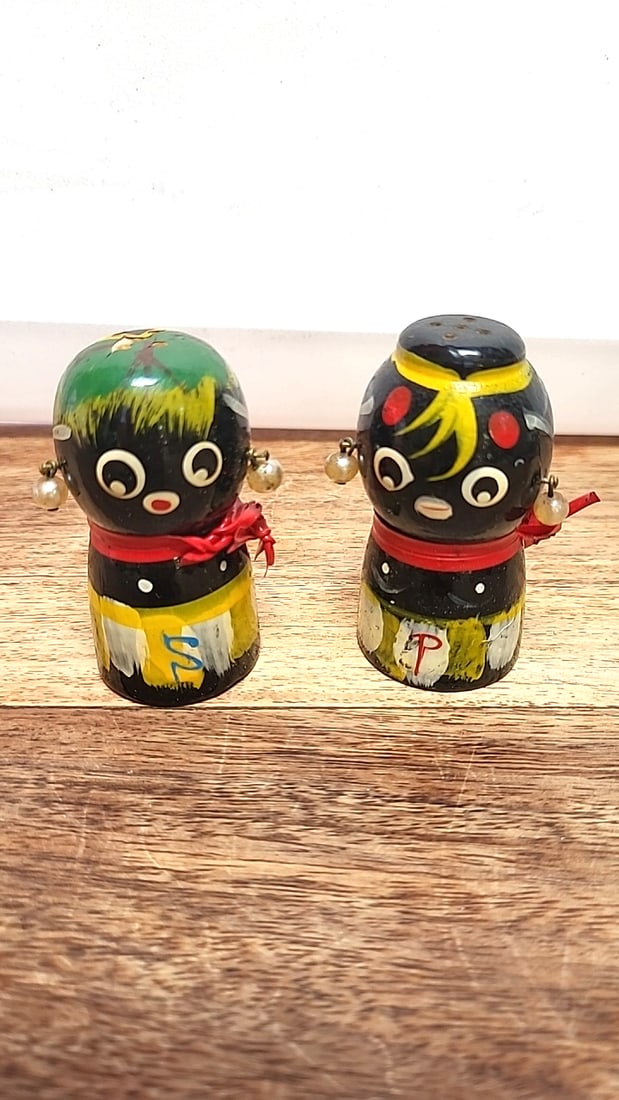Mid Century Japanese Figural Salt and Pepper Shakers with Red Scarves and Pearl Earrings: 4.5 x 3.2 x 2.0 0.5 lb Low Estimate: 12.00 High Estimate: 35.00