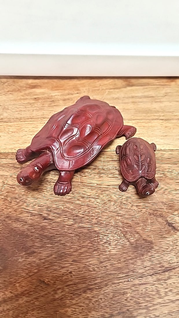 Pair of Chinese Carved ironwood Turtle Figurines with Carved Shell Detail: 6 x 1.5 x 4 0.8 lb Low Estimate: 8.00 High Estimate: 75.00