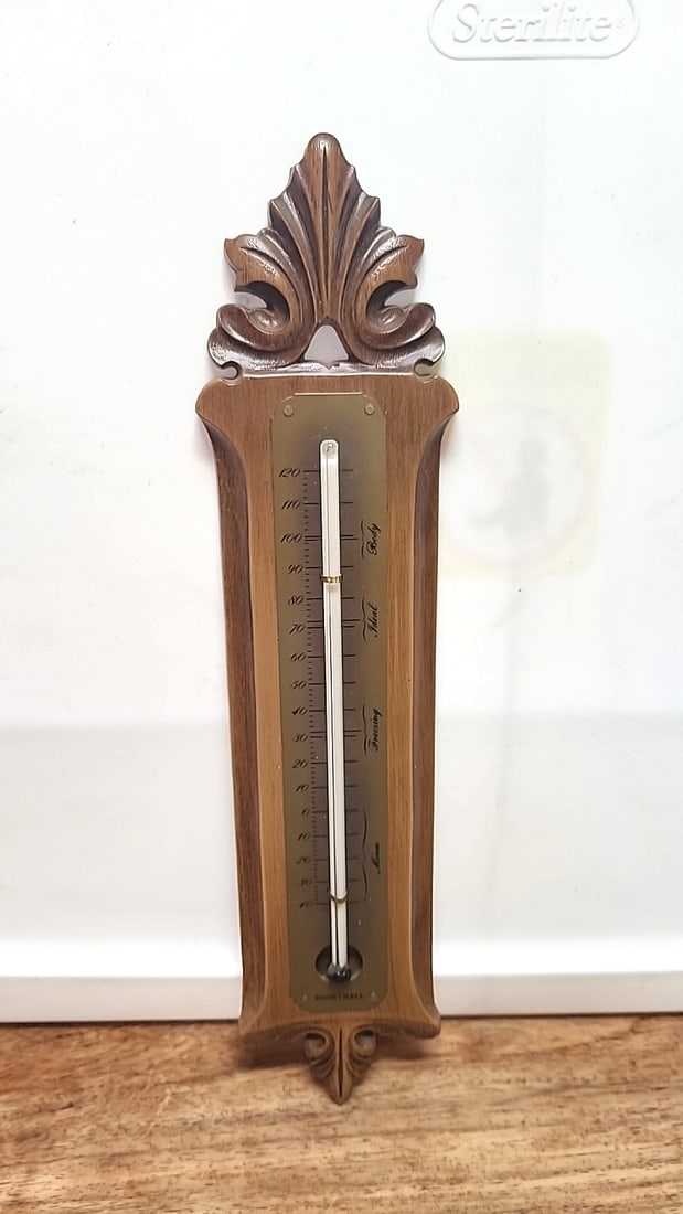 Honeywell Wood Wall Thermometer with Ornate Frame Made in USA: 5 x 12 x 0.8 1.2 lb Low Estimate: 10.00 High Estimate: 35.00