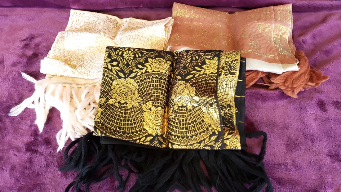 Lot of 3 Gold Floral Jacquard Scarves/Shawls, Black Cream Peach, Fringe: Greek silk and wool 19 x 15 x 2.5 1.5 lb Low Estimate: 10.00 High Estimate: 30.00
