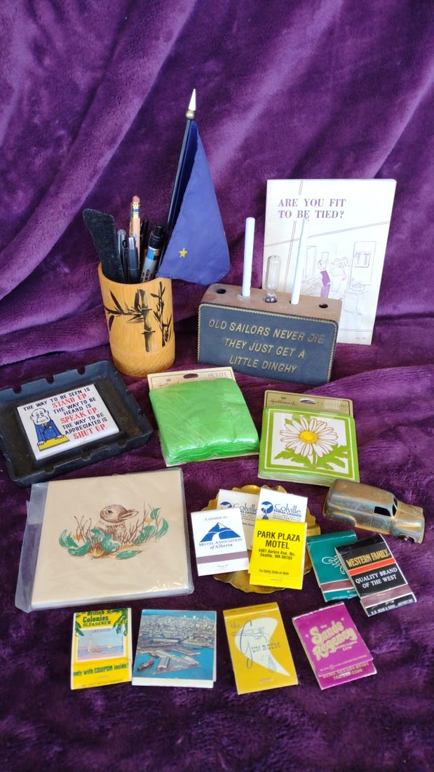 Mixed Collectibles Lot Park Plaza Motel Sands Regency Matchbooks, Brass Ashtray, Toy Car, Pens, C...: 12x7x4 3lb Low Estimate: 8.00 High Estimate: 35.00