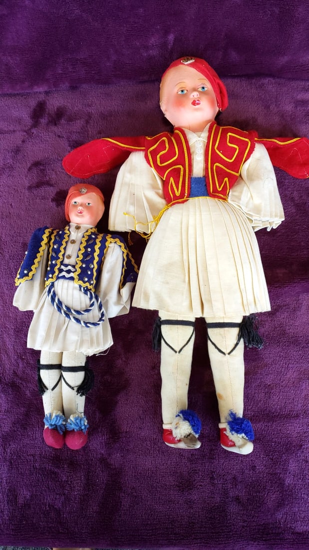 Greek Evzone Tsolias Folk Costume Dolls Red & Blue Vests Lot of 2: 11 x 16 x 3 1.2 lb Low Estimate: 15.00 High Estimate: 35.00