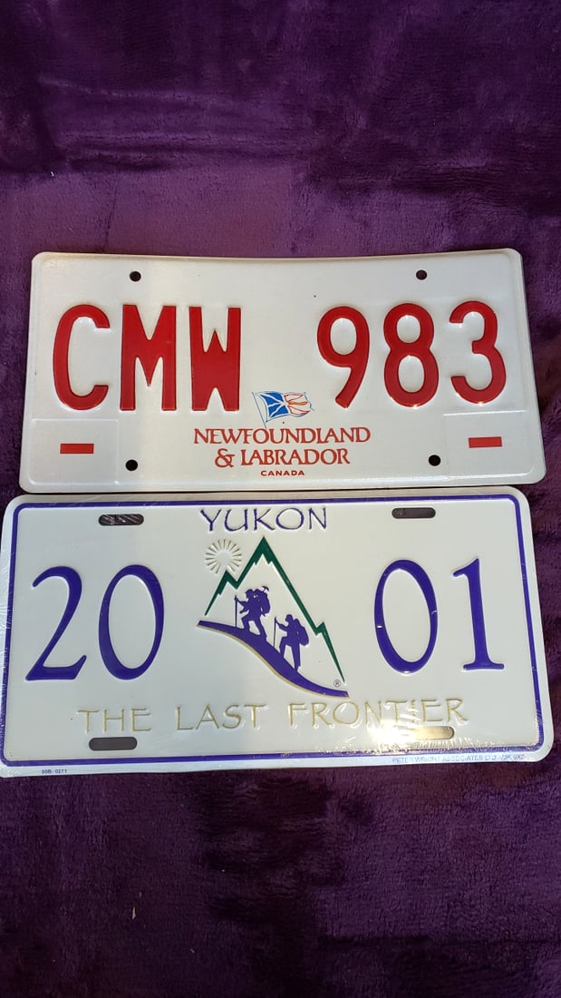 Lot of 2 Canadian License Plates Newfoundland & Labrador CMW 983 and Yukon 20 01: 12 x 12 x 0.1 1 lb Low Estimate: 10.00 High Estimate: 35.00