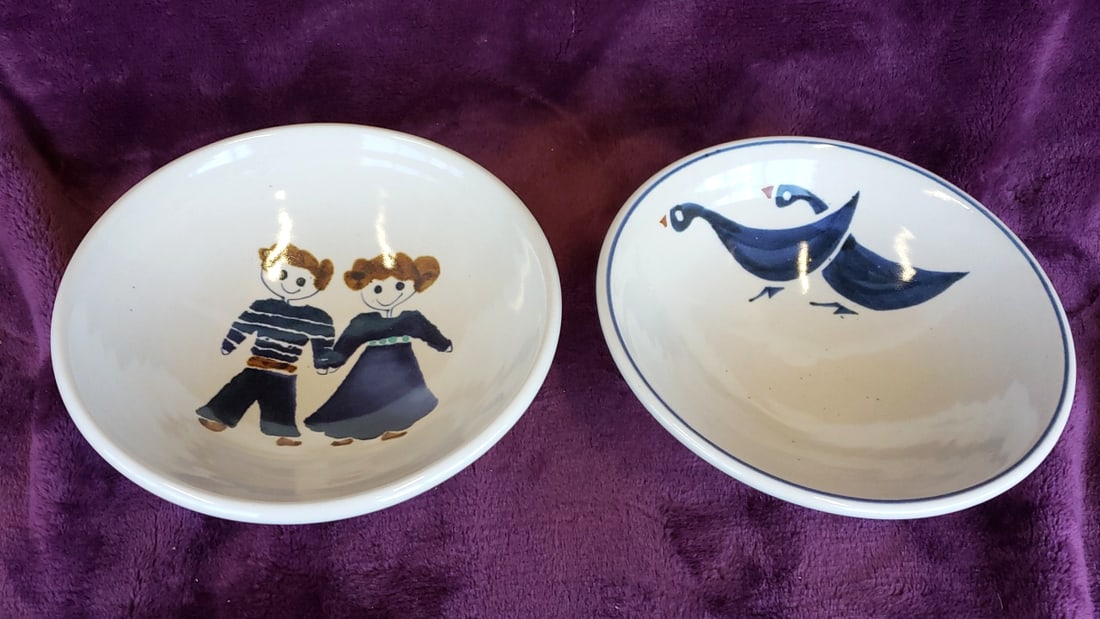 Pair of Signed 6 in Ceramic Bowls with Folk Art Children and Blue Bird Designs: 13 x 2.25 x 6 1.8 lb Low Estimate: 15.00 High Estimate: 50.00