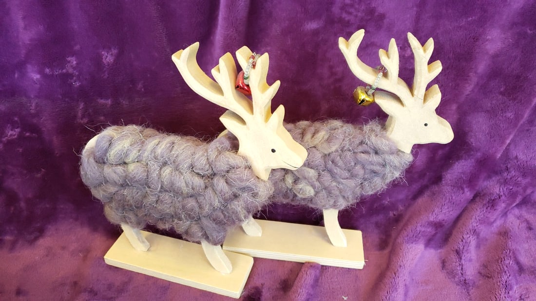 Pair of Wooden Reindeer Figurines with Wool Bodies and Jingle Bell Antlers on Bases: 9 x 6.5 x 3 0.4 lb Low Estimate: 8.00 High Estimate: 30.00