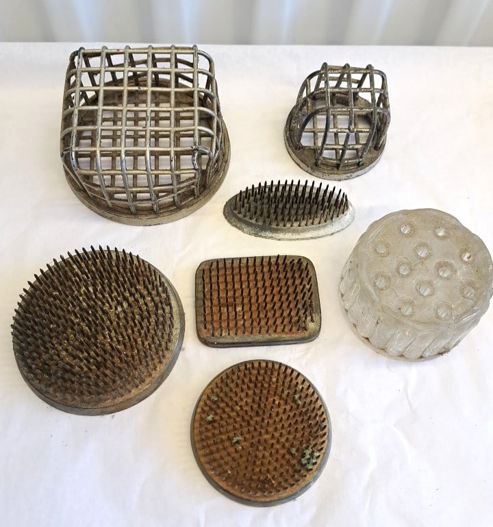 H. Locher Berne Swiss Metal cages, and other Flower Frogs: 19 x 6 x 4in. 6lb Low Estimate: 25.00 High Estimate: 120.00