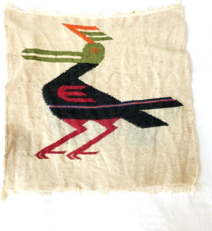 Woven Textile Wall Hanging Rug Bird Motif Beige Black Red Green Fringed Edges: 7 x 7 x 2in. 1kb Low Estimate: 15.00 High Estimate: 65.00