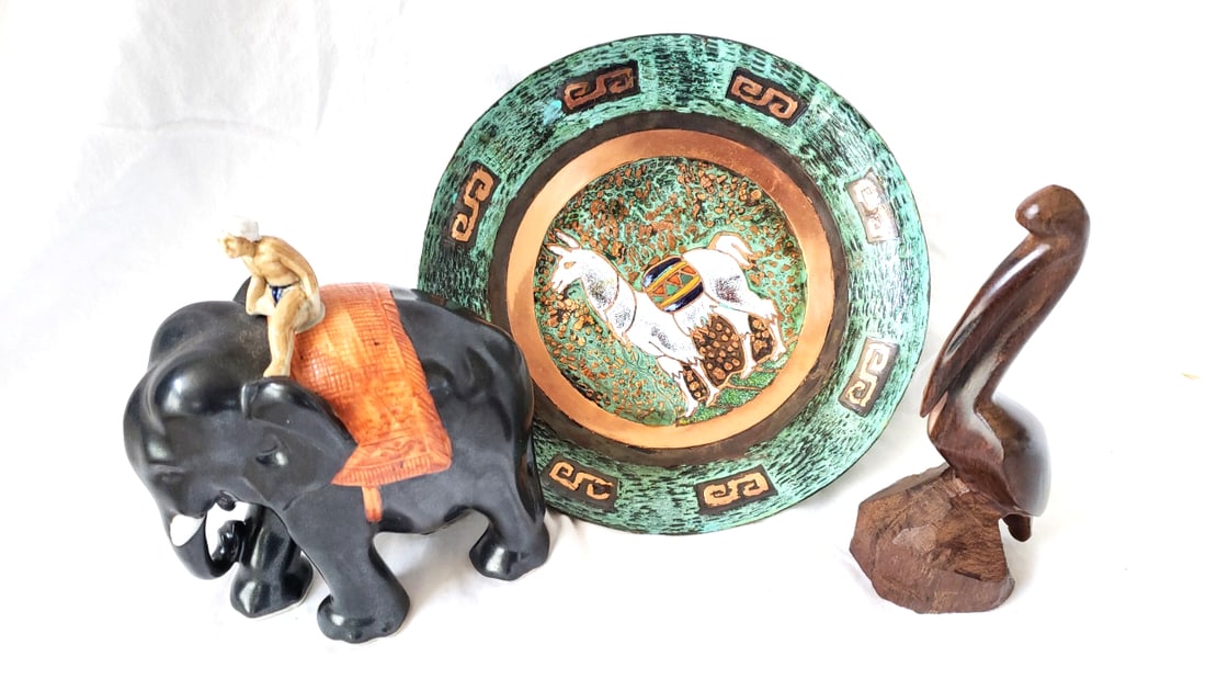 Decorative Animal Lot: Black Elephant with Rider, Turquoise Plate, Wooden Pelican Carving: 12 x 7 x 5 2.5 lb Low Estimate: 12.00 High Estimate: 45.00
