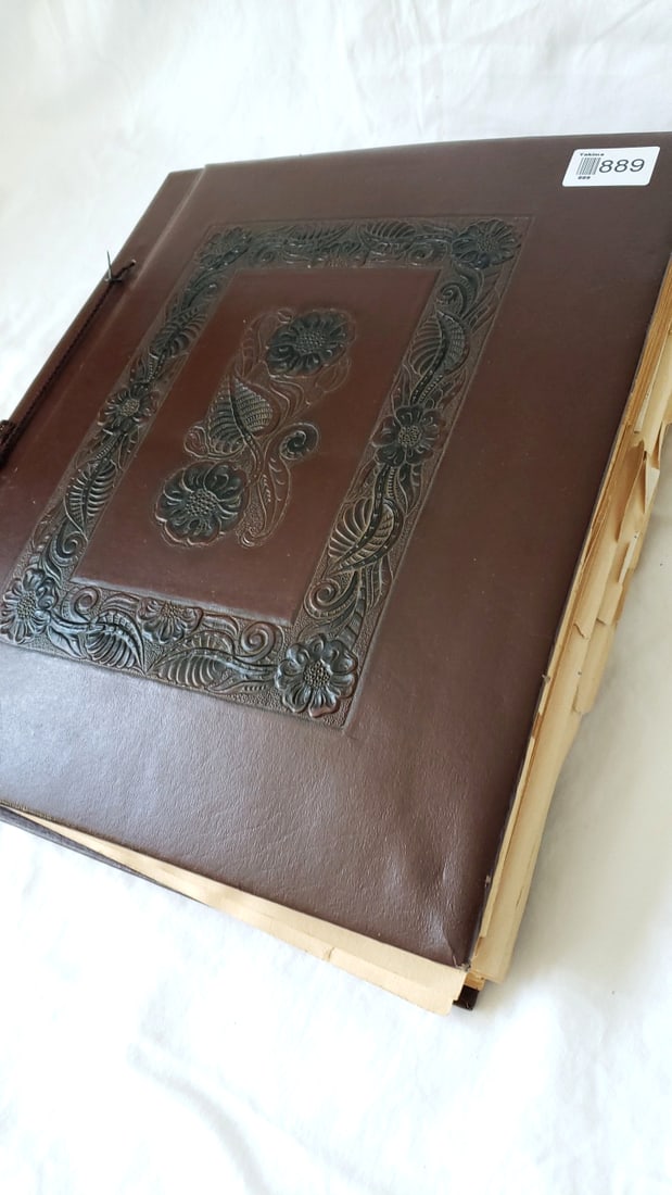 1945 WWII Era Scrapbook Album with Letters, Menus & Travel Ephemera, Tooled Leather Cover: 13 x 16 x 2.5 5.5 lb Low Estimate: 40 High Estimate: 250