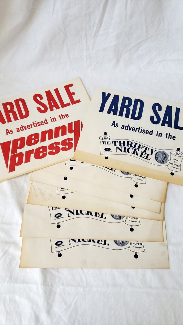 Penny Press & The Thrifty Nickel Yard Sale Advertising Signs Red Blue Lot: 14 x 11 x 0.5 0.7 lb Low Estimate: 10.00 High Estimate: 35.00