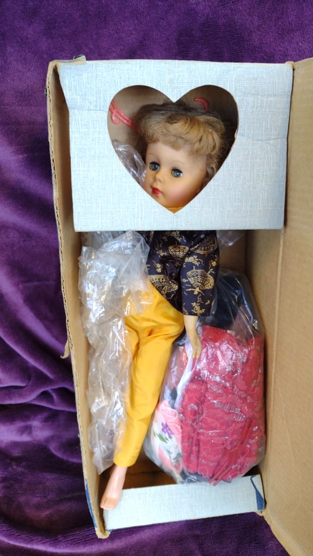 LuAnn Teen Age Doll Vinyl Head Rooted Wig with Box and Outfits: 20 x 7 x 4 2 lb Low Estimate: 35.00 High Estimate: 250.00