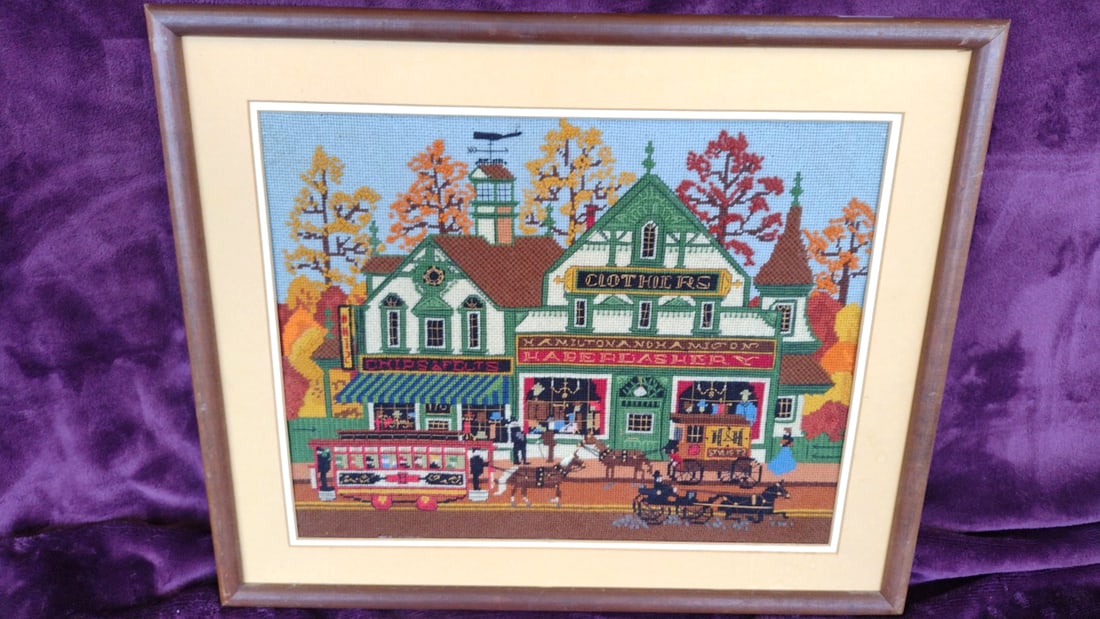 Framed Needlepoint Embroidery Victorian Storefronts Horse-Drawn Trolley Wall Art: 29 x 21 x 1.5 6 lb Low Estimate: 15.00 High Estimate: 75.00