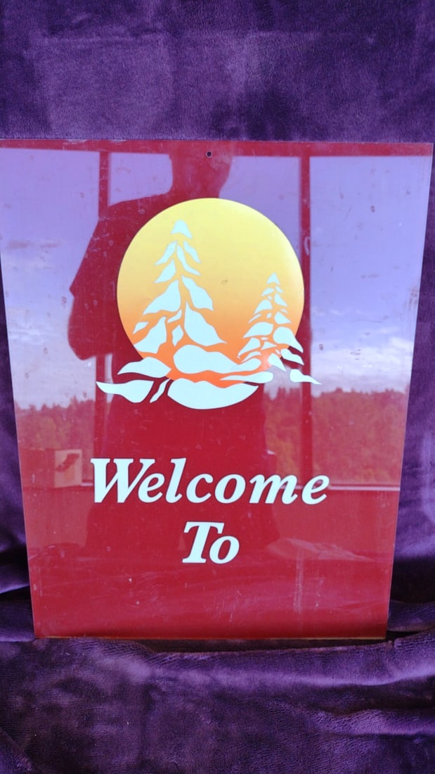 Red Acrylic "Welcome To" Sign with Pine Trees and Sunset Graphic: 16 x 24 x 0.25 3.5 lb Low Estimate: 5.00 High Estimate: 18.00