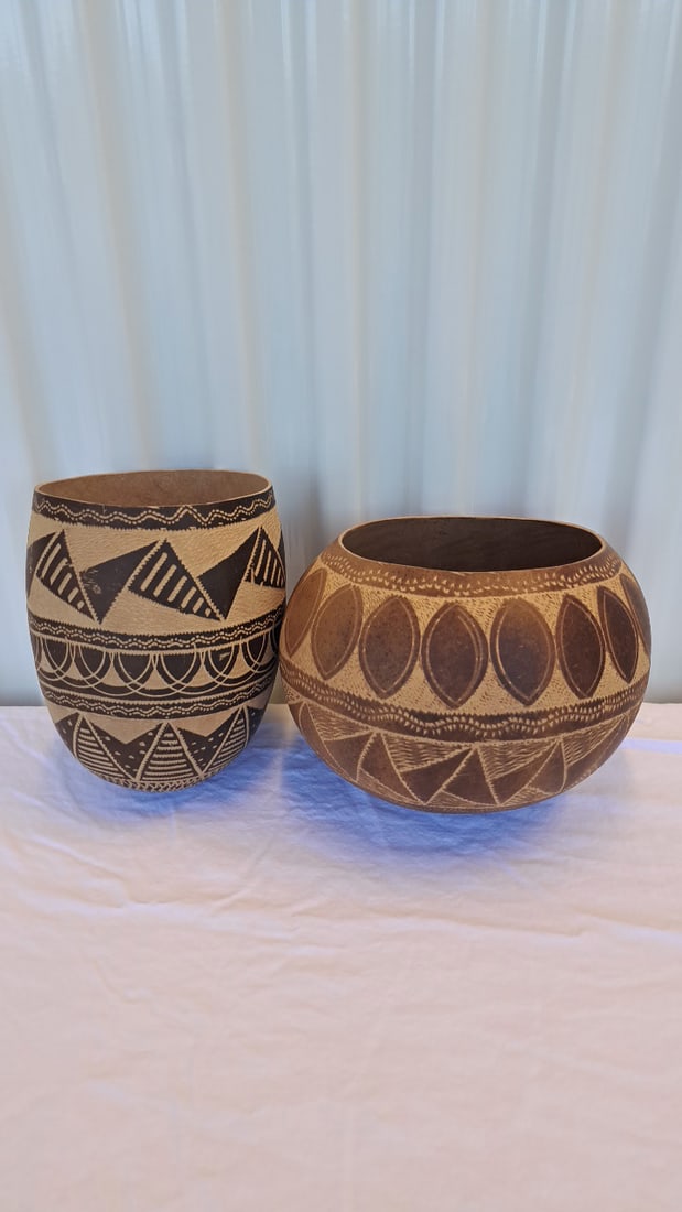 Pair Of Etched Brown Gourd Vessels With Geometric Patterns, Approx. 6-8 In Tall: 16 x 10 x 10 1lb Low Estimate: 15.00 High Estimate: 75.00