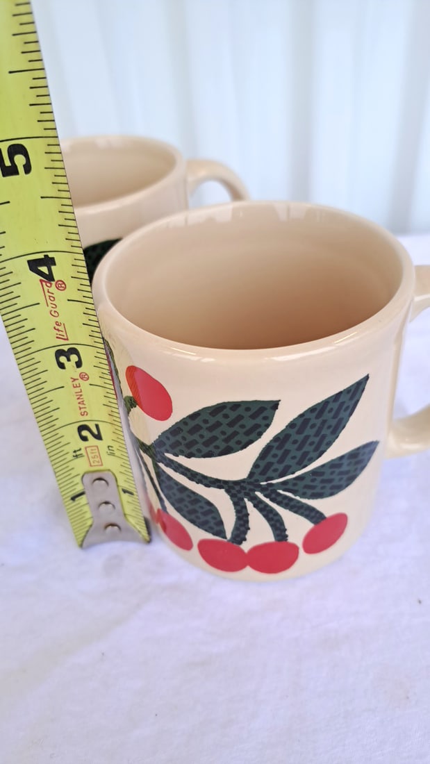Pair Of Cream Ceramic Mugs With Red Cherry And Green Leaf Design - 2