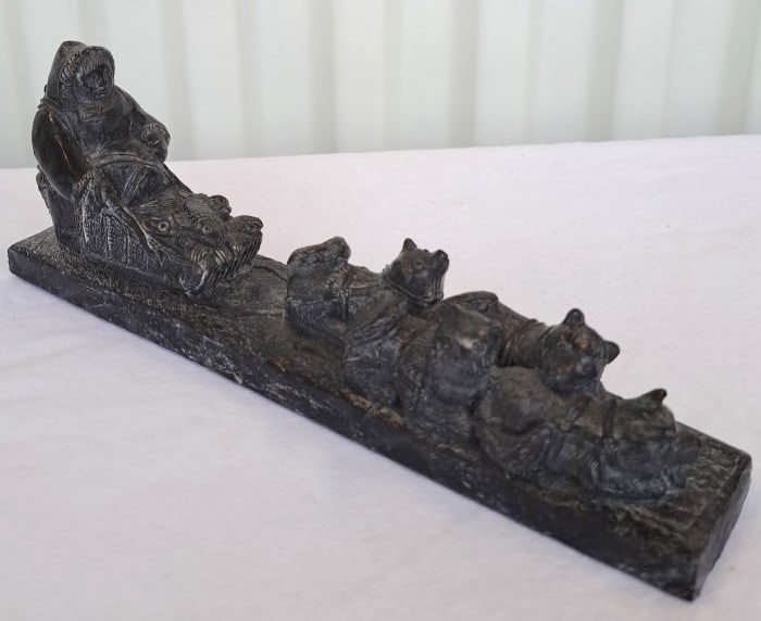 A Wolf Original Soapstone Eskimo With Dog Sled: 9 x 3 x 2in. 1lb 8. 5 x 2. 8 x 1. 7 1. 8 lb Low Estimate: 30.00 High Estimate: 60.00