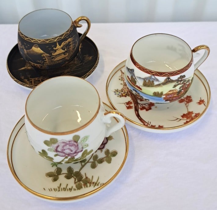 3 Japanese Porcelain Demitasse Cup Saucer Sets, Gilt Landscape And Floral Designs: Good condition. No issues. 7 x 7 x 5in. 1lb Low Estimate: 18.00 High Estimate: 90.00