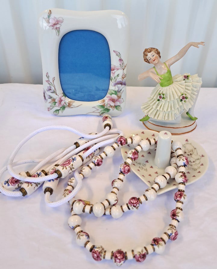 Porcelain Vanity Lot Dresden Lace Dancer, Floral Picture Frame,, Beads, Love Is Kind Ring Dish: Dresden lace dancer has one fingertip missing and i believe there might be a tiny bit of frill missing as well. 7 x 7 x 5in 2lb Low Estimate: 25.00 High Estimate: 85.00
