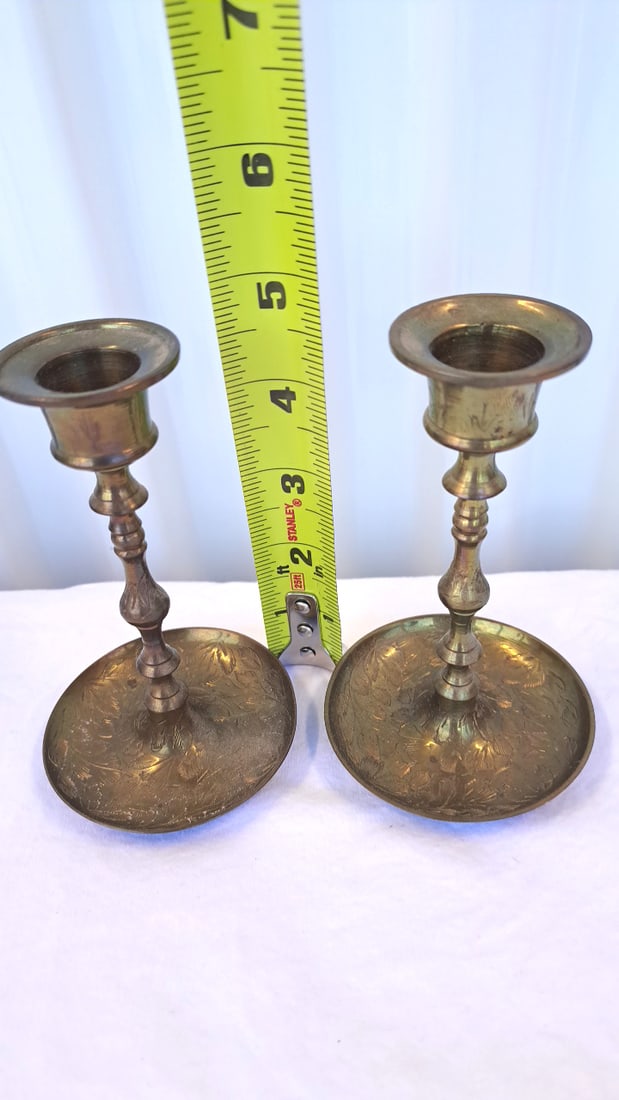 Pair Of Brass Candlestick Holders With Engraved Floral Round Bases - 2
