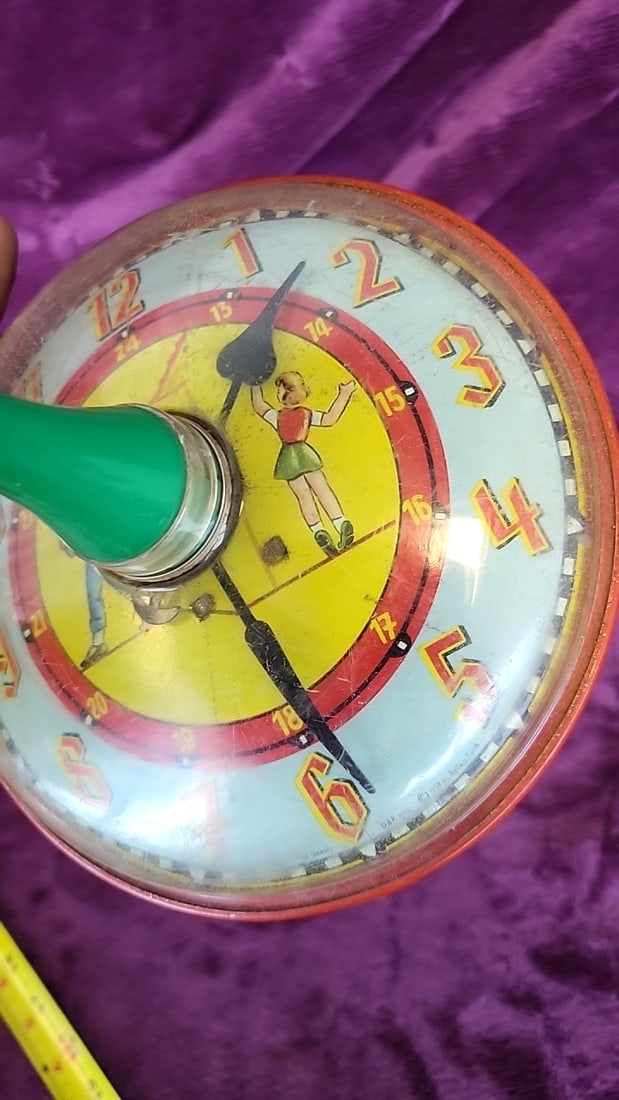 Tin Litho Clock Face Spinning Top Toy With Green Handle And Red Base - 2