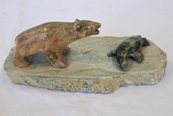John Alurac Alaska Carved Stone Polar Bear And Seal Sculpture: 5 x 5 x 3in. 1lb Low Estimate: 80.00 High Estimate: 250.00