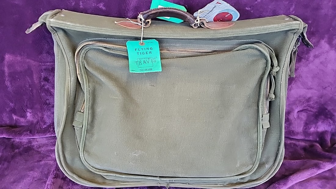 Flying Tiger British Travis Tachikawa Olive Canvas Cabin Baggage Suitcase 24": 25 x 15 x 8. 5 5 lb Low Estimate: 18.00 High Estimate: 50.00