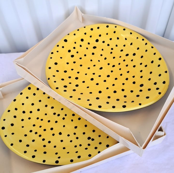 Dept 56 2 Yellow Ceramic Plates With Black Polka Dot Pattern: 10 x 7 x 3in. 3lb Low Estimate: 8.00 High Estimate: 25.00
