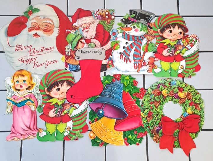 Christmas Cardboard Die-cut Wall Decorations Santa Elf Snowman Wreath Lot: 18 x 17 x 1in. 1lb there are a couple of pieces of tape but they are still in a good shape. The santa is a thun plastic and has some tears. Low Estimate: 8.00 High Estimate: 30.00