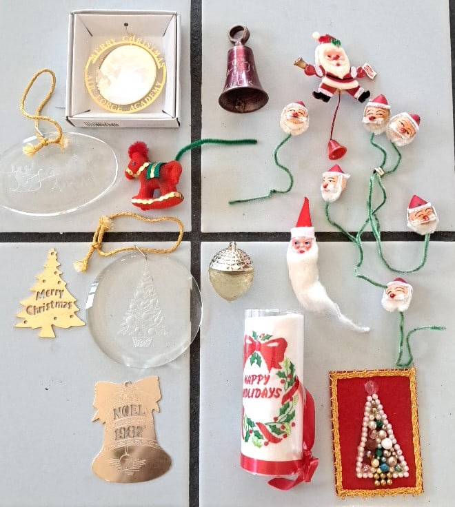 Christmas Ornament Lot Santa Heads 1987 Noel Bell Air Force Academy Ornaments: Clear ornaments are acrylic. 7 x 5 x 4in. 2lb Low Estimate: 8.00 High Estimate: 35.00