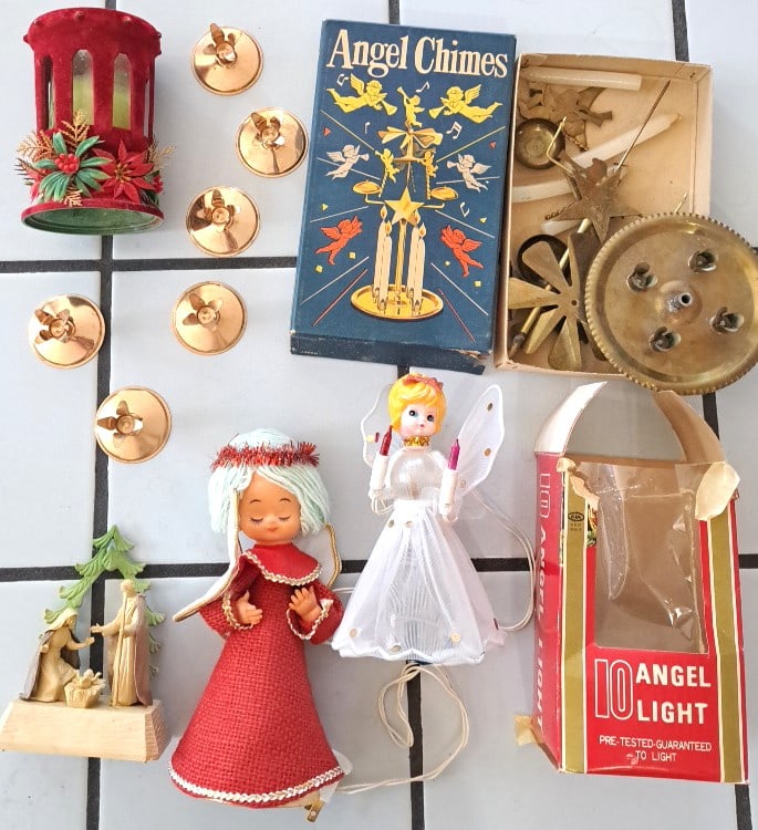 Christmas Angel Chimes Angel Light Decorations Lot With Nativity Lantern: Angel chimes untested. Treetop. Angel is. Missing. A bulb so is untested. Some. Wear on red flock. 10 x 10 x 8in. 3lb Low Estimate: 10.00 High Estimate: 45.00