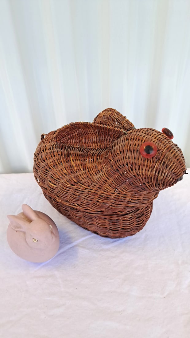 Woven Wicker Rabbit Basket With Lid And Dept 56 Pink Ceramic Bunny: Ceramic bunny is very dusty period 8 x 8 x 6in. 1lb Low Estimate: 12.00 High Estimate: 35.00